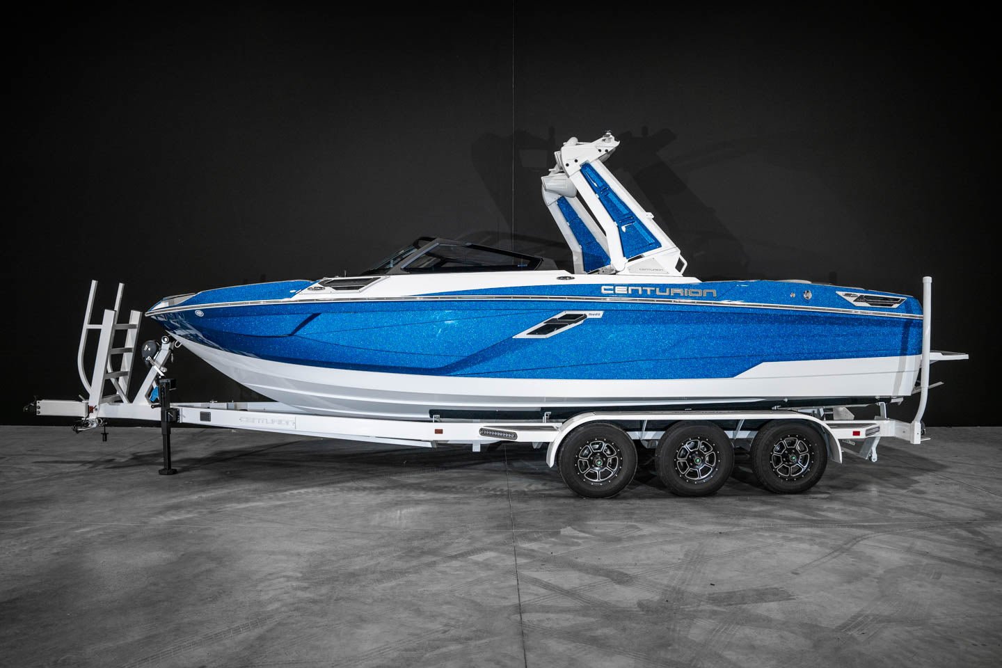 https://boardcoboats.com/cdn/shop/products/2023-centurion-ri245-marina-blue-flake-white-336224.jpg?v=1685734753